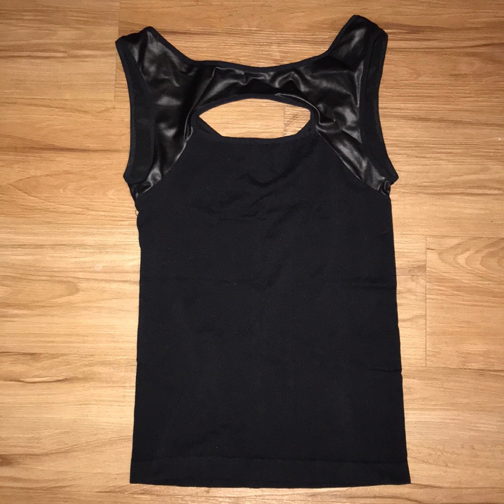 Spandex and leather black BEBE top